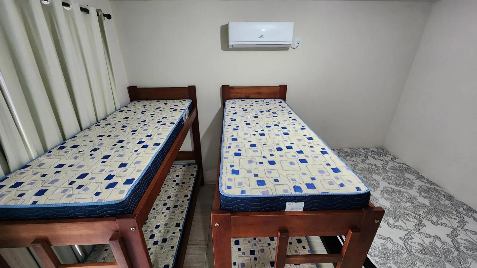 Quarto em Acomodações Particulares Pousada Nova Trilha Apartamento Palhoça